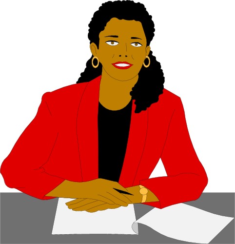 Business: Woman sitting at a desk