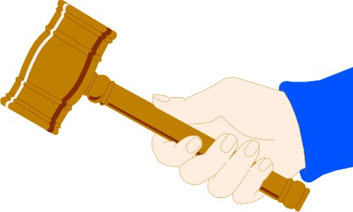 Hands: Holding a gavel