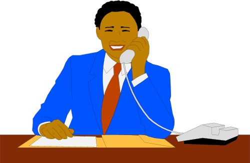 Business: Businessman speaking on the phone